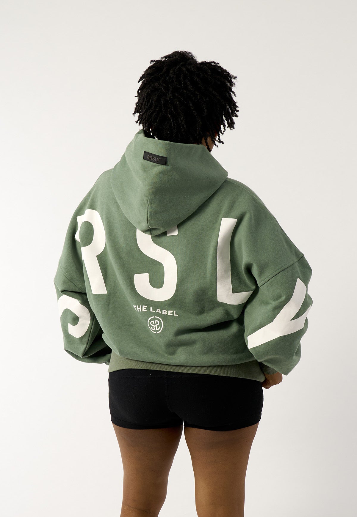 womens-oversize-signature-hoodie-in-green-with-block-print-logo-07
