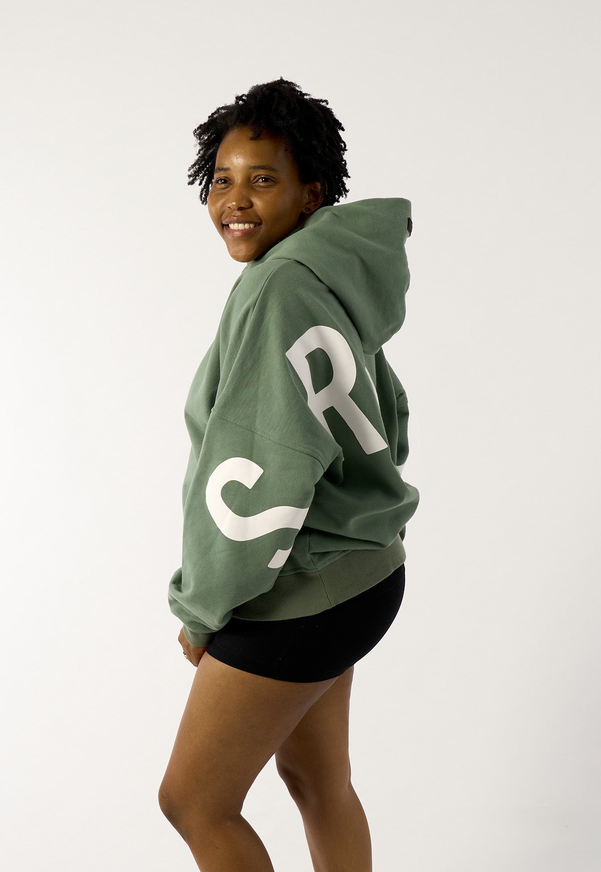womens-oversize-signature-hoodie-in-green-with-block-print-logo-09