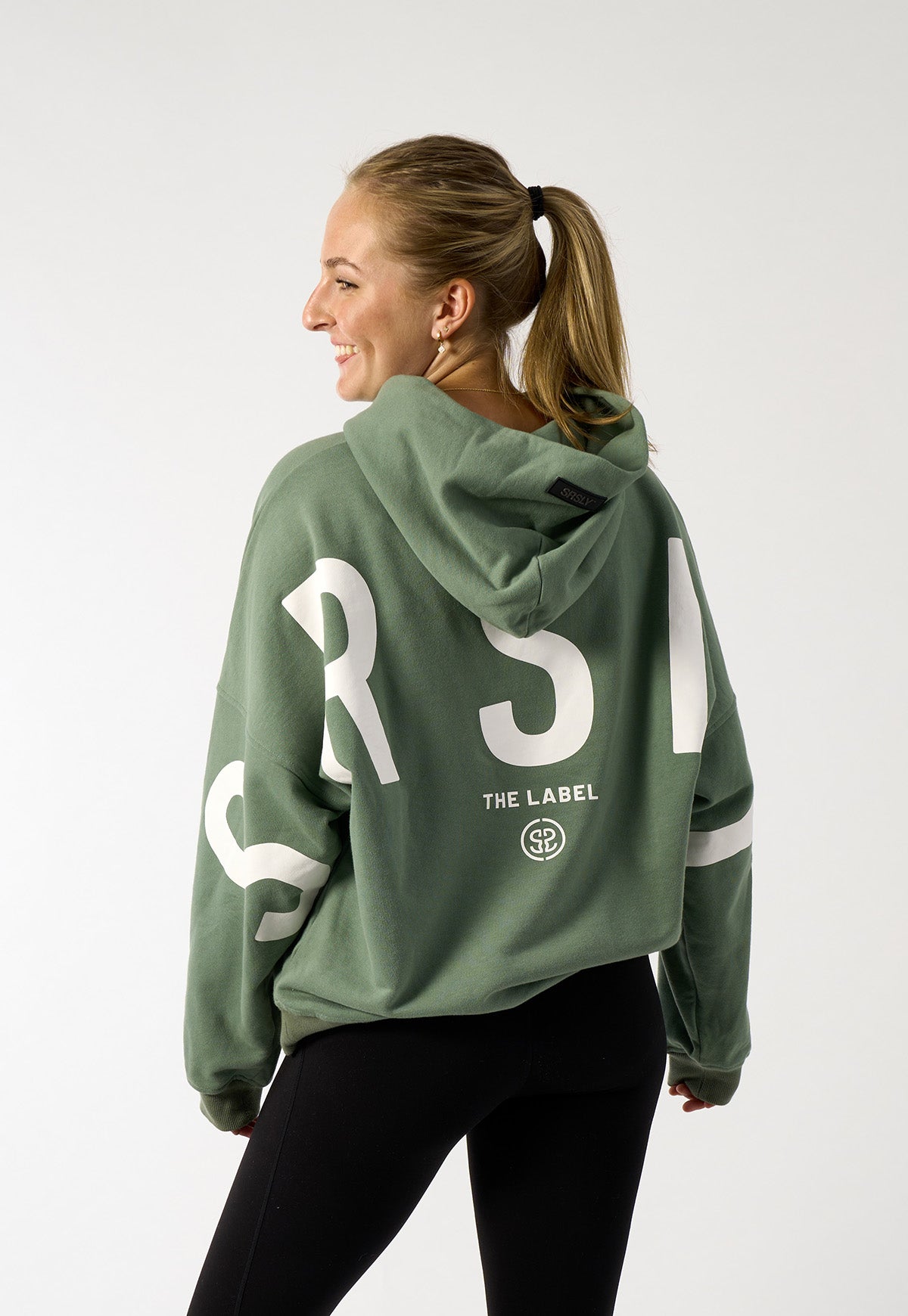 womens-oversize-signature-hoodie-in-green-with-block-print-logo-06